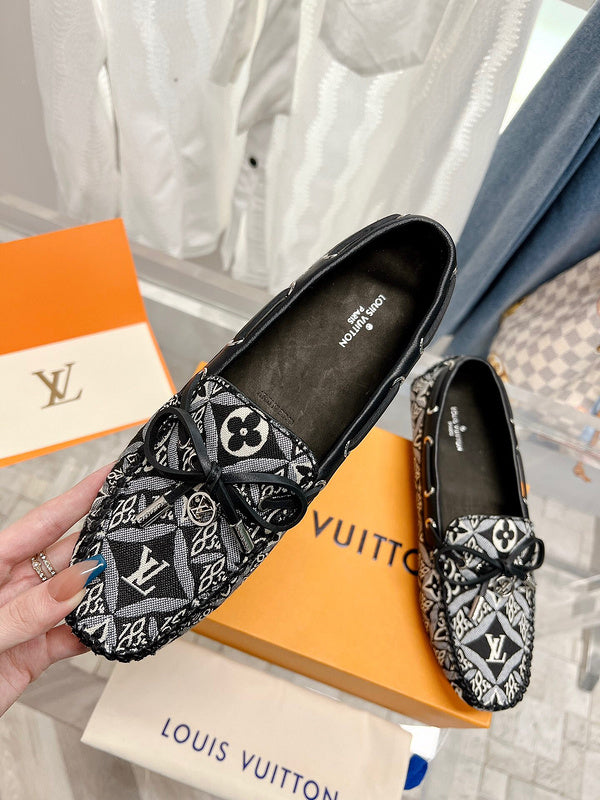 Louis Vuitton Black Classic Ballet Flats - Angled View