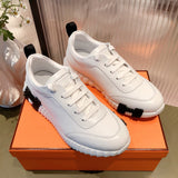 Hermès White High-Top Sneakers - Sole Detail View