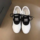 Balenciaga shoes Style 315 - front view, statement logo accent