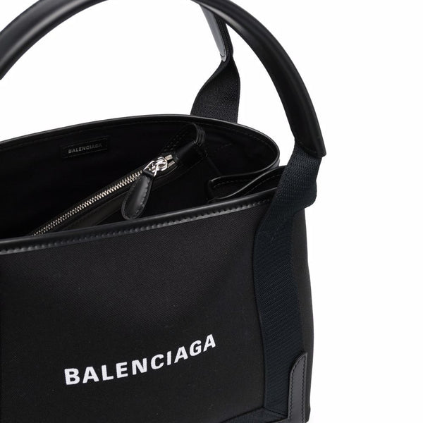 Close-up of Balenciaga totes hardware and fine stitching