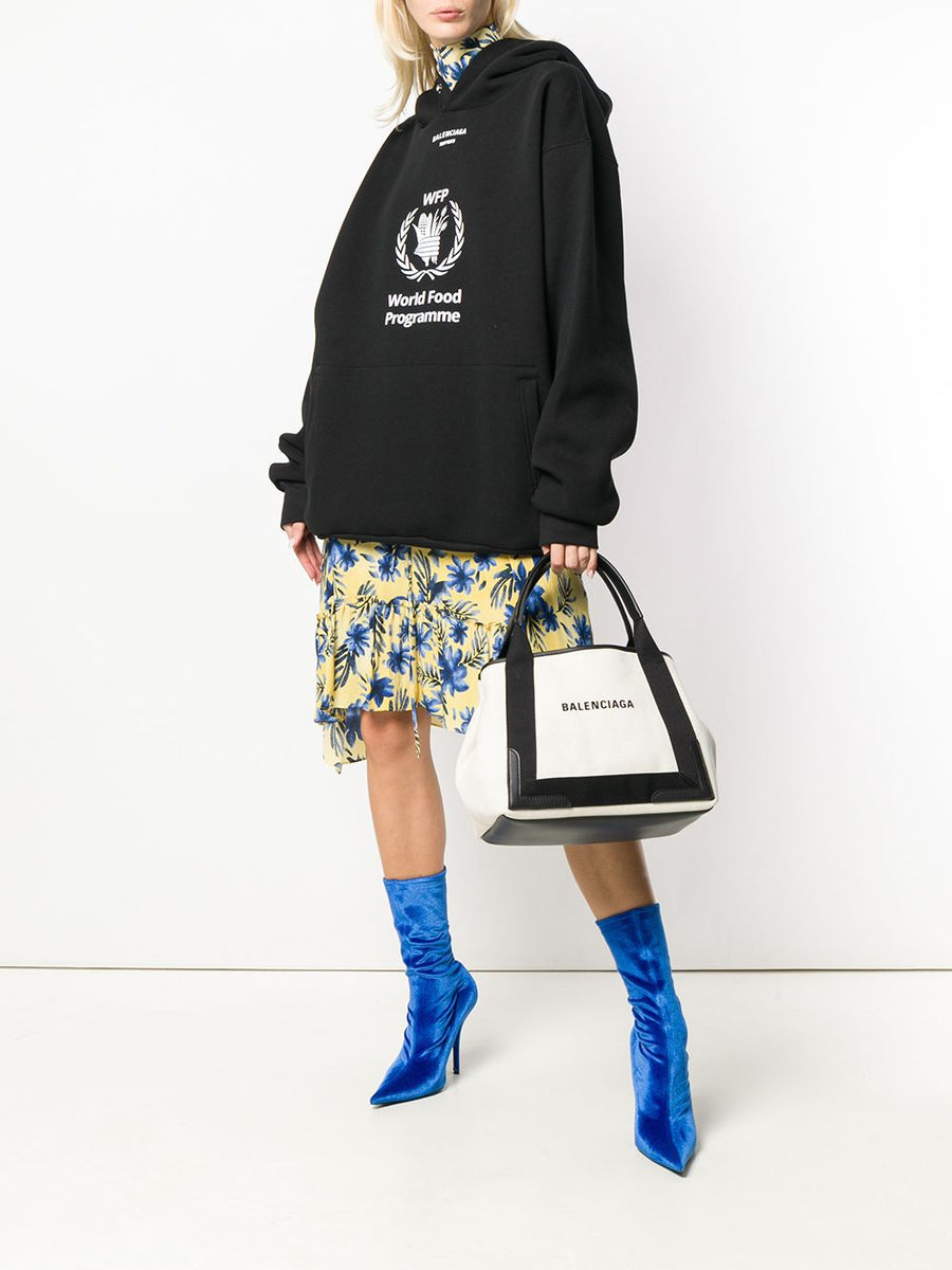 Close-up of Balenciaga totes hardware and fine stitching