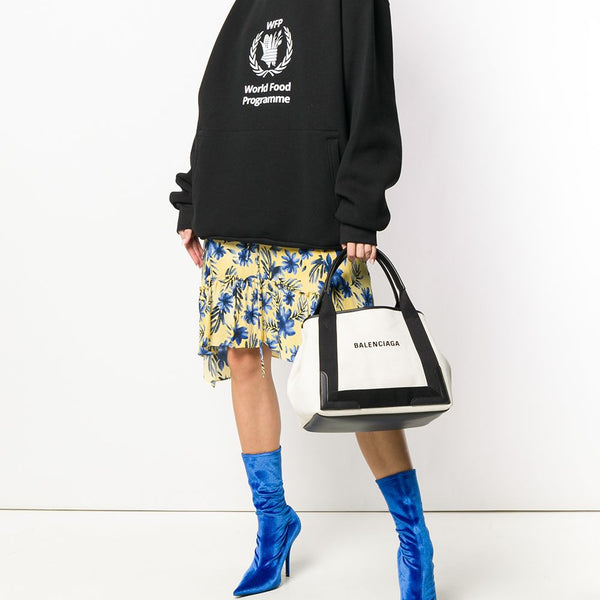 Close-up of Balenciaga totes hardware and fine stitching