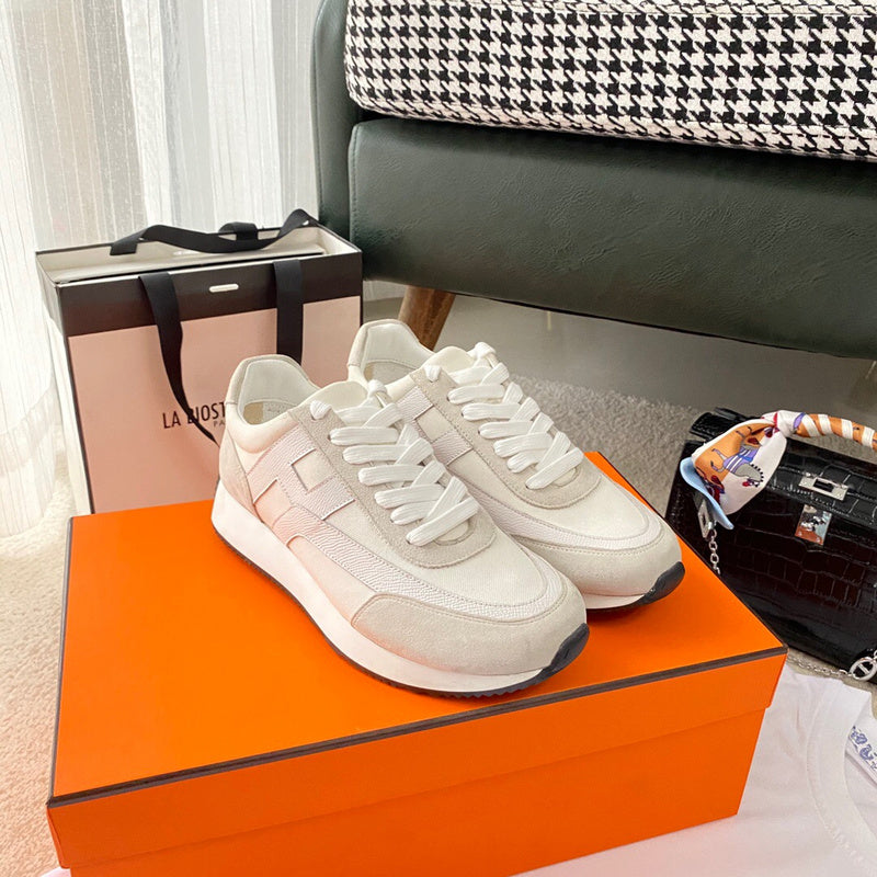 Hermès White Chunky Platform Sneakers - Angled View