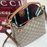 Front view of Gucci Emblem Mini Bucket Bag premium bucket bag