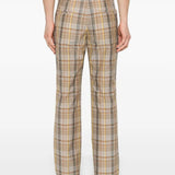 Close-up of Fendi pants hardware and fine stitching