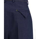 Close-up of Bottega Veneta pants hardware and fine stitching