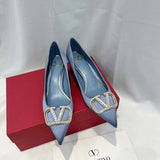 Close-up detail view of Valentino Garavani luxury piece style No.216