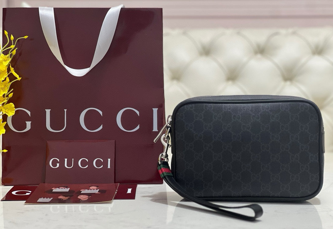 Front view of Gucci premium Pouch with iconic logo hardware
