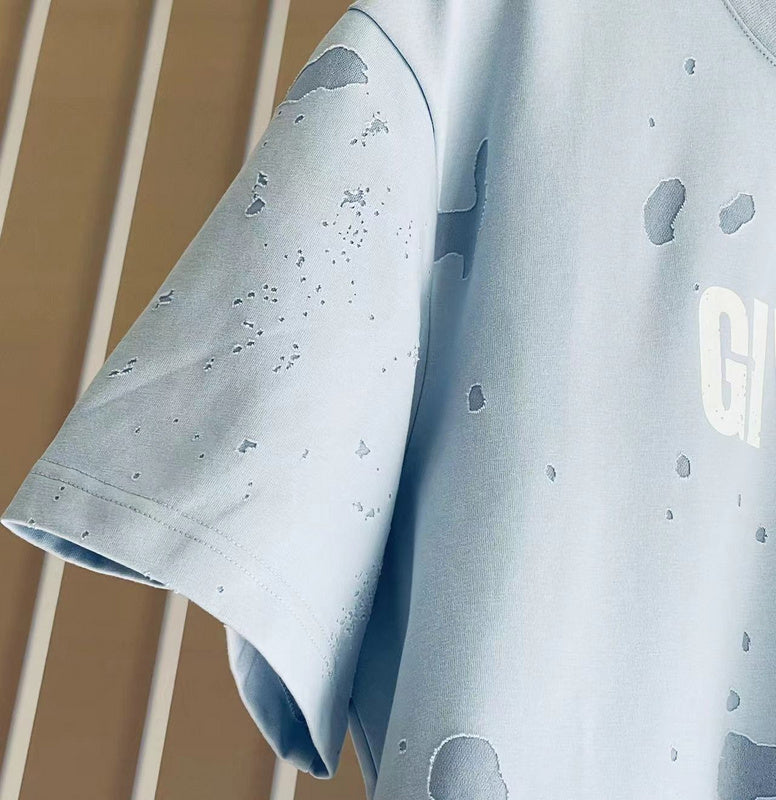 Texture and finish detail of Givenchy luxury piece style No.214