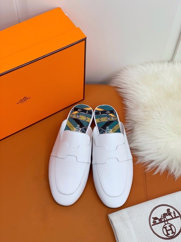 Hermès Black Loafer Flats - Side Profile View