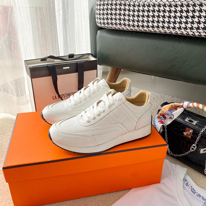Hermès White Chunky Platform Sneakers - Heel Detail View