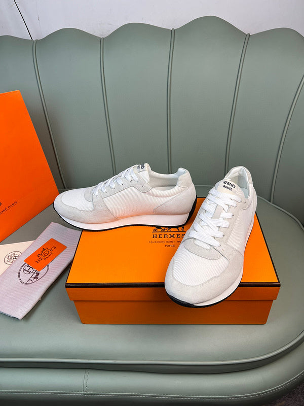 Hermes shoes Style 078 - close-up of statement logo accent