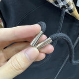 Texture and finish detail of Burberry luxury piece style No.410