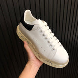 Alexander McQueen Nude Slip-On Sneakers - Angled View