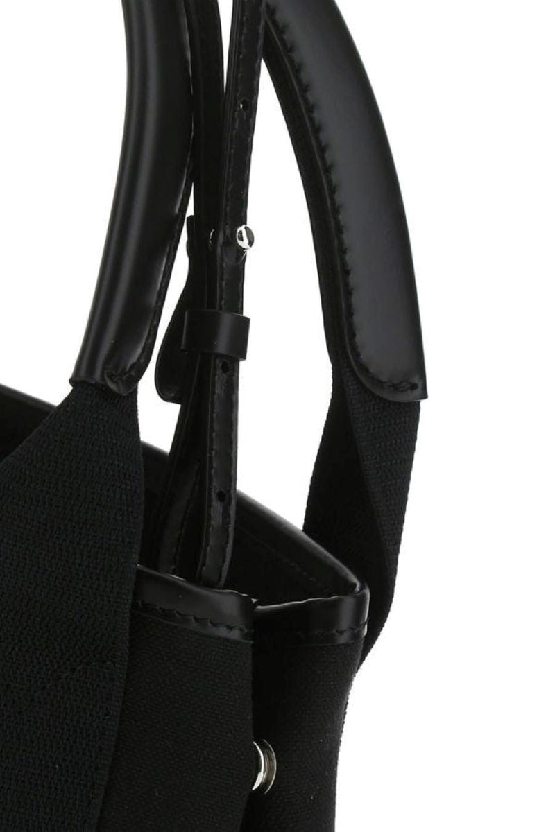 Close-up of Balenciaga handbags hardware and fine stitching