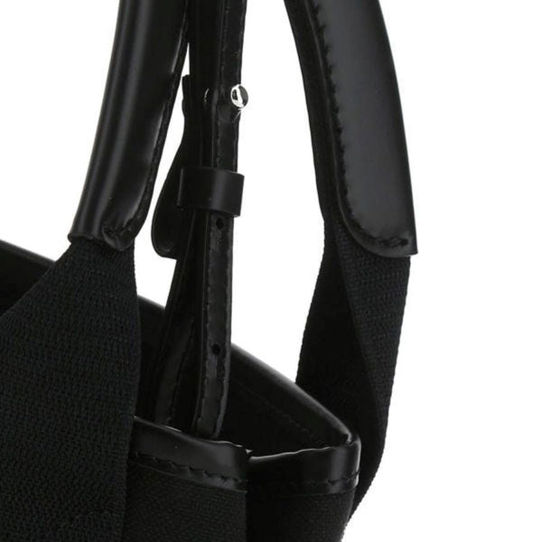 Close-up of Balenciaga handbags hardware and fine stitching