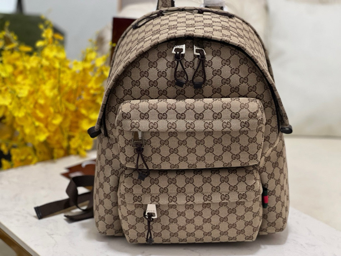 Side profile of Gucci Backpack showcasing structured silhouette