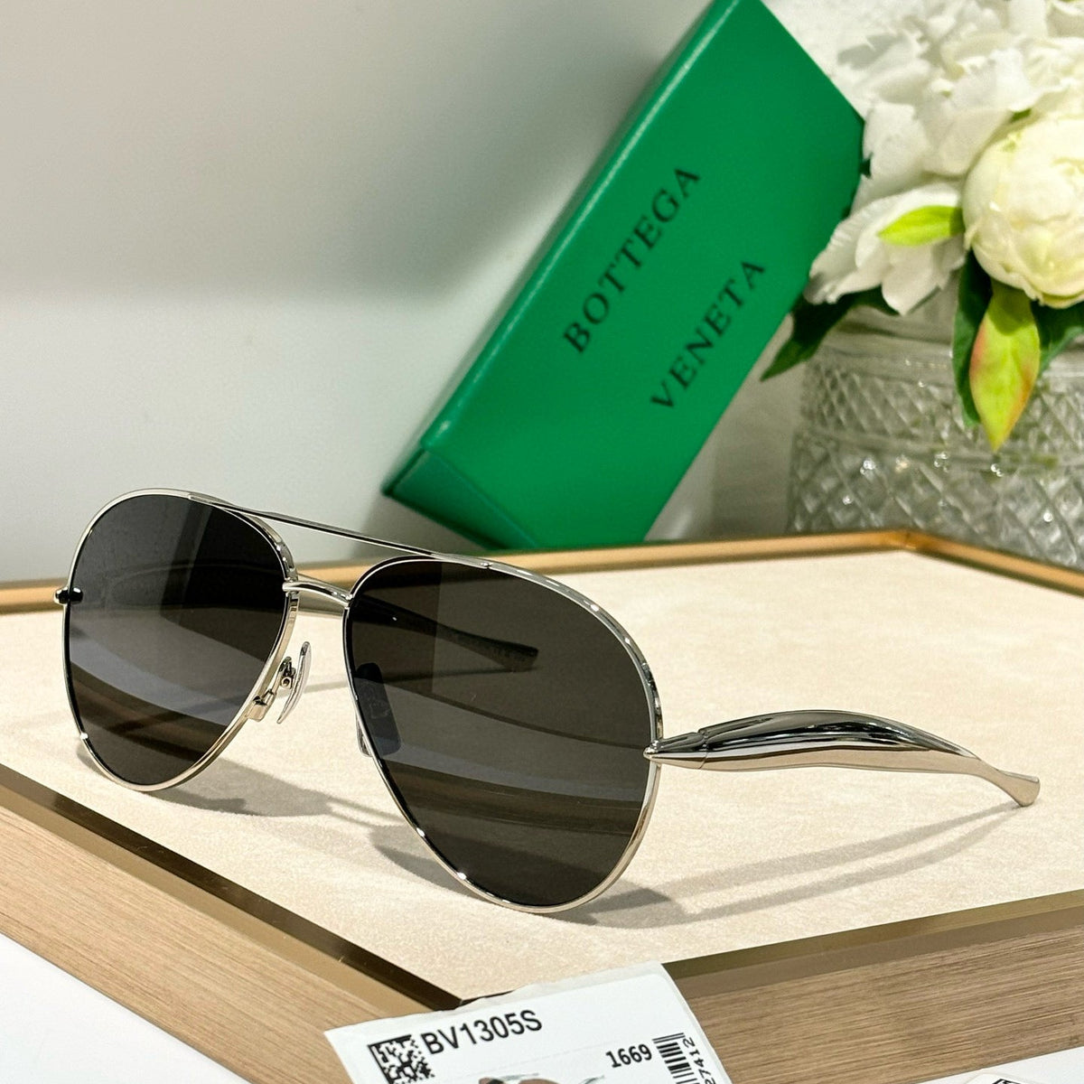 Bottega Veneta Sunglasses detail shot – authentic designer craftsmanship