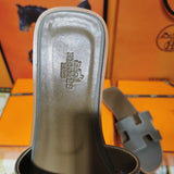 Hermès Camel Flat Thong Sandals - Lifestyle Styling Shot