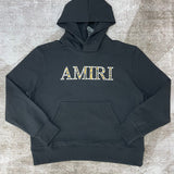 Close-up detail view of Amiri luxury piece style No.037
