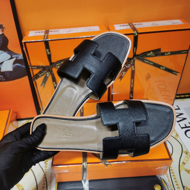 Hermès Grey Gladiator Sandals - Angled View