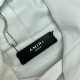Three-quarter angle view of Amiri luxury piece style No.012