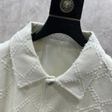 Close-up of Burberry designer clothing craftsmanship