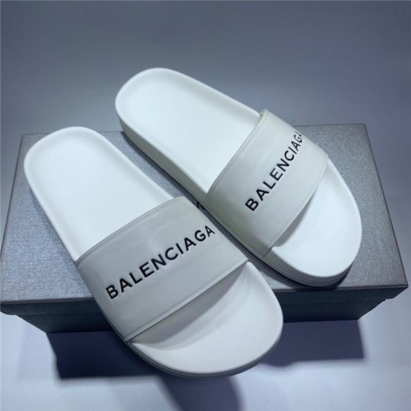 Balenciaga Grey Slide Sandals - Angled View