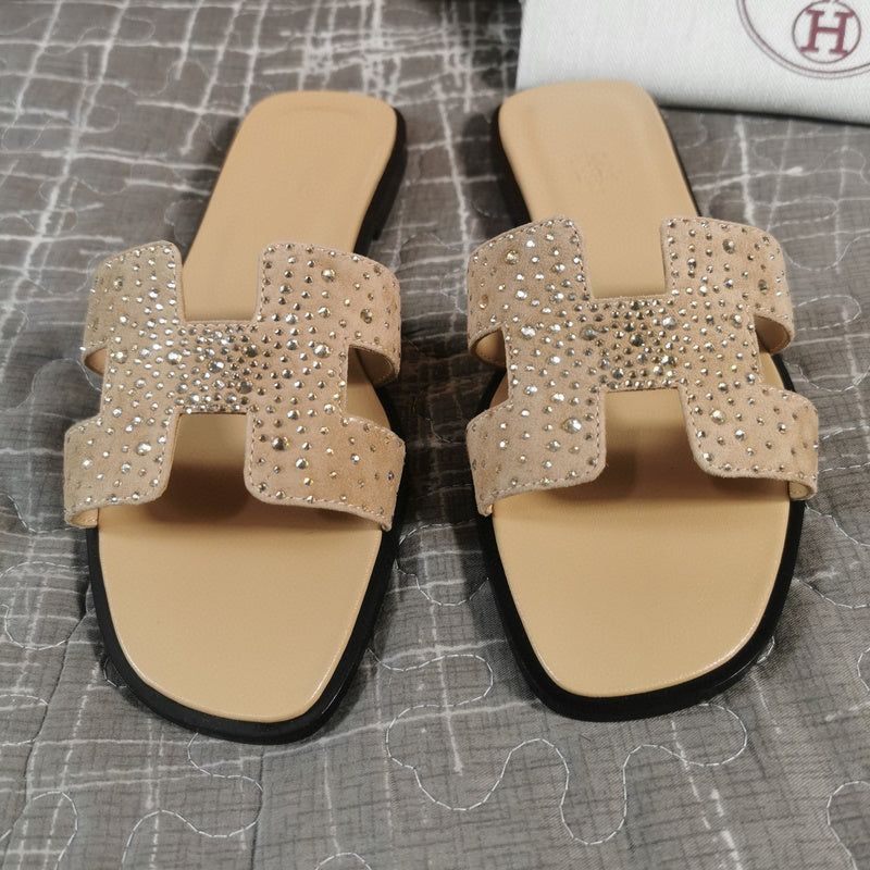 Hermes sandals Style 145 - styled lifestyle view