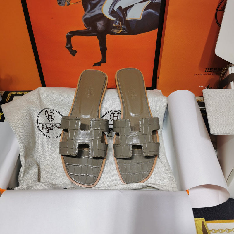 Hermes sandals Style 110 - styled lifestyle view