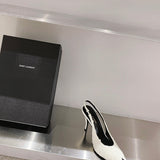 Full silhouette view of Saint Laurent luxury piece style No.104