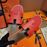 Hermes sandals Style 087 - close-up of statement logo accent