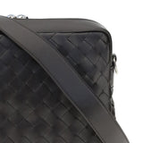 Close-up of Bottega Veneta cross body bags hardware and fine stitching