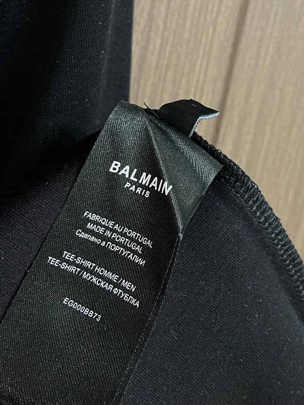 Side profile view of Balmain luxury piece style No.046