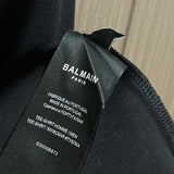 Side profile view of Balmain luxury piece style No.046