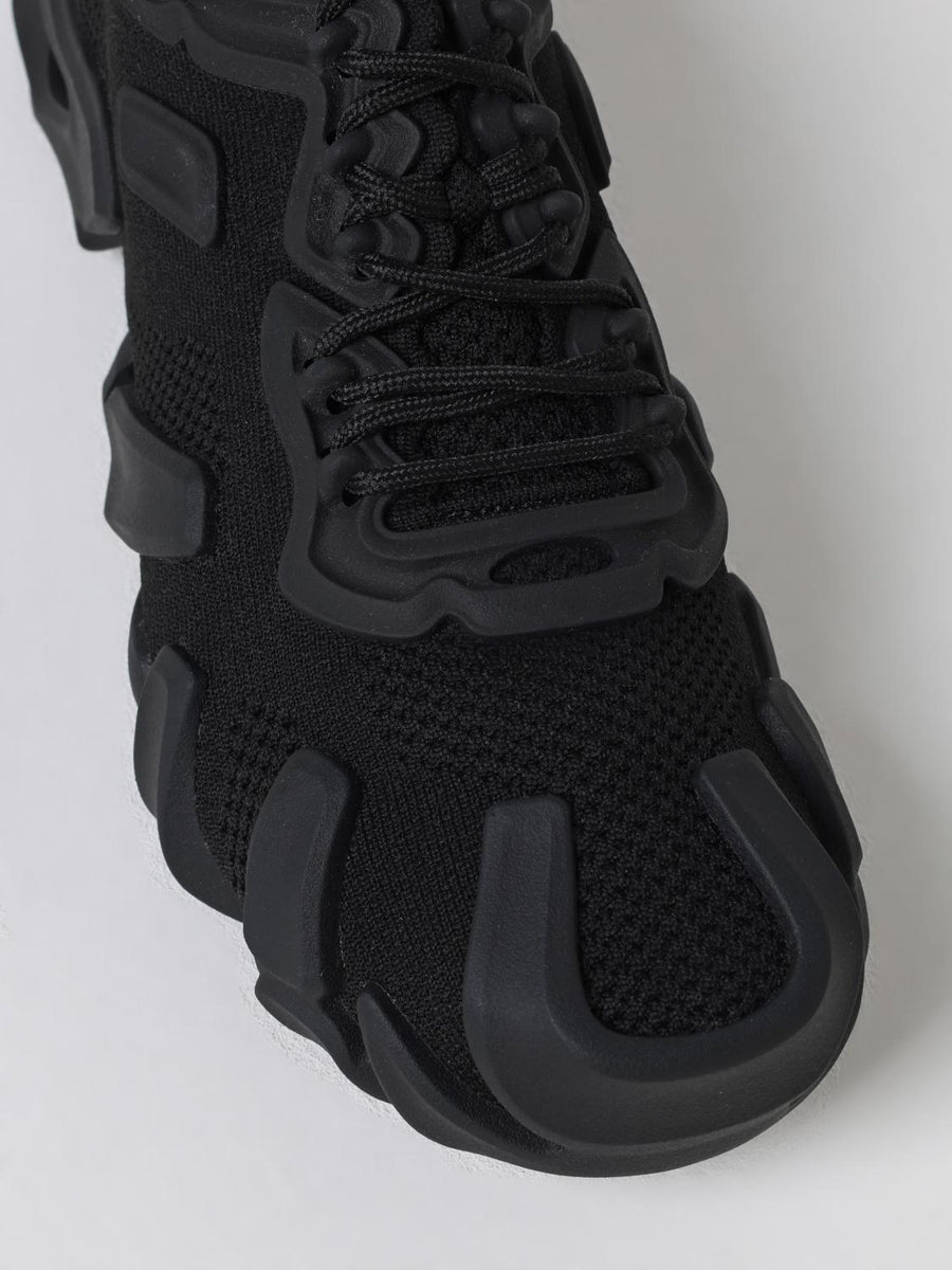 Close-up of Bottega Veneta athletic hardware and fine stitching