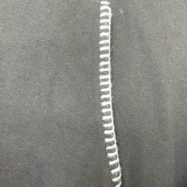 Close-up detail view of Amiri luxury piece style No.092