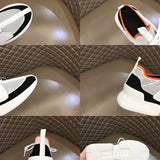 Hermès Red High-Top Sneakers - Detail Shot of Craftsmanship