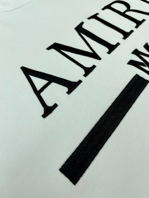 Three-quarter angle view of Amiri luxury piece style No.075