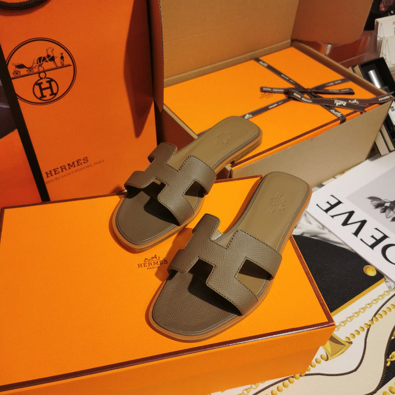 Hermes sandals Style 095 - angled studio shot