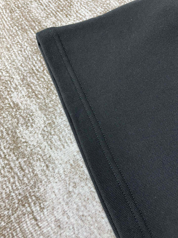 Three-quarter angle view of Amiri luxury piece style No.058