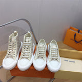 Louis Vuitton Black High-Top Sneakers - Front View