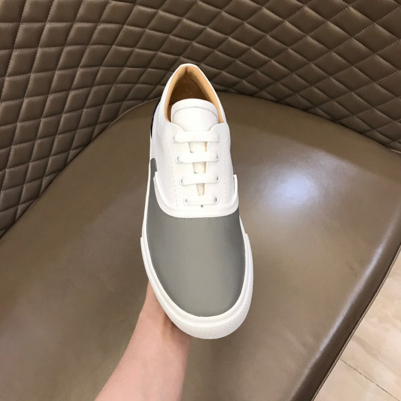 Hermès Chocolate Brown High-Top Sneakers - Angled View