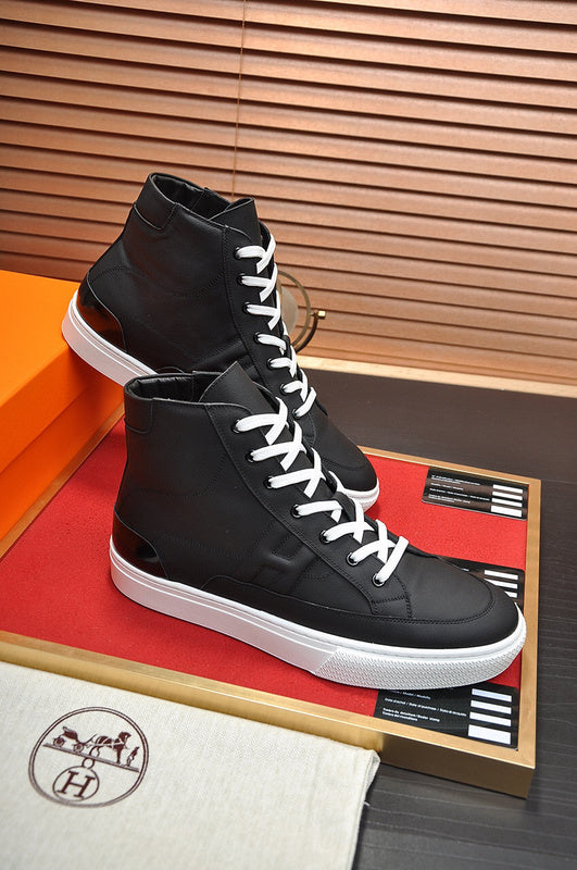 Hermès Black Slip-On Sneakers - Close-Up Texture View