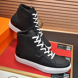 Hermès Black Slip-On Sneakers - Close-Up Texture View