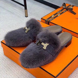 Hermès White Chelsea Boots - Angled View