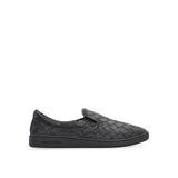 Close-up of Bottega Veneta athletic hardware and fine stitching