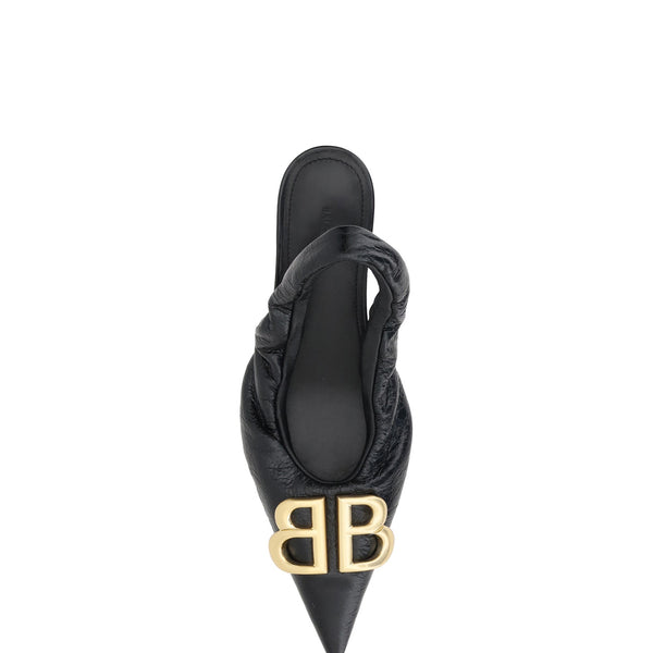 Close-up of Balenciaga pumps hardware and fine stitching
