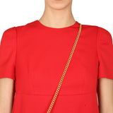Close-up of Alexander McQueen cocktail dresses hardware and fine stitching