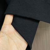Close-up of Balenciaga designer clothing craftsmanship